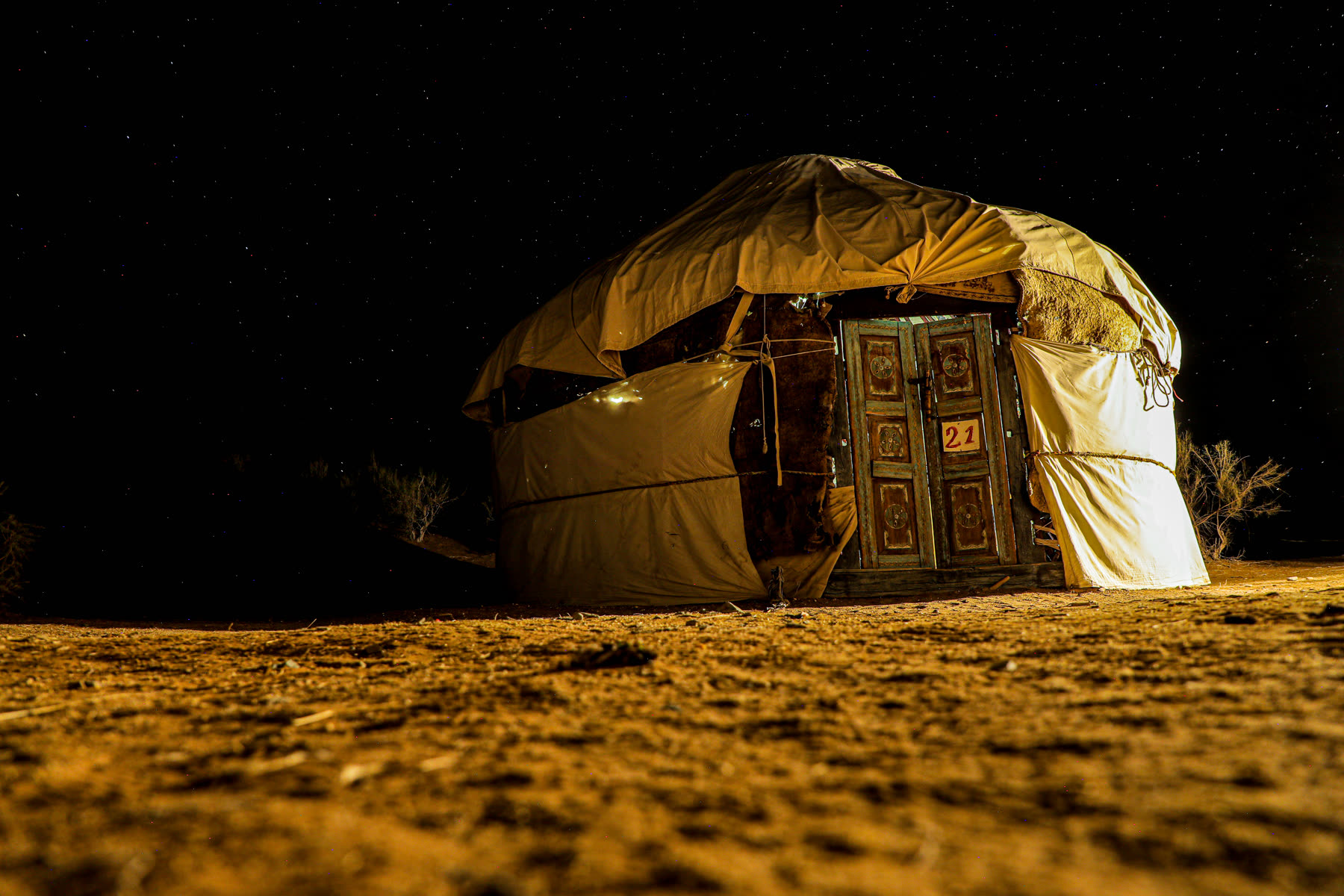 A yurt camp in the Kyzylkum at night